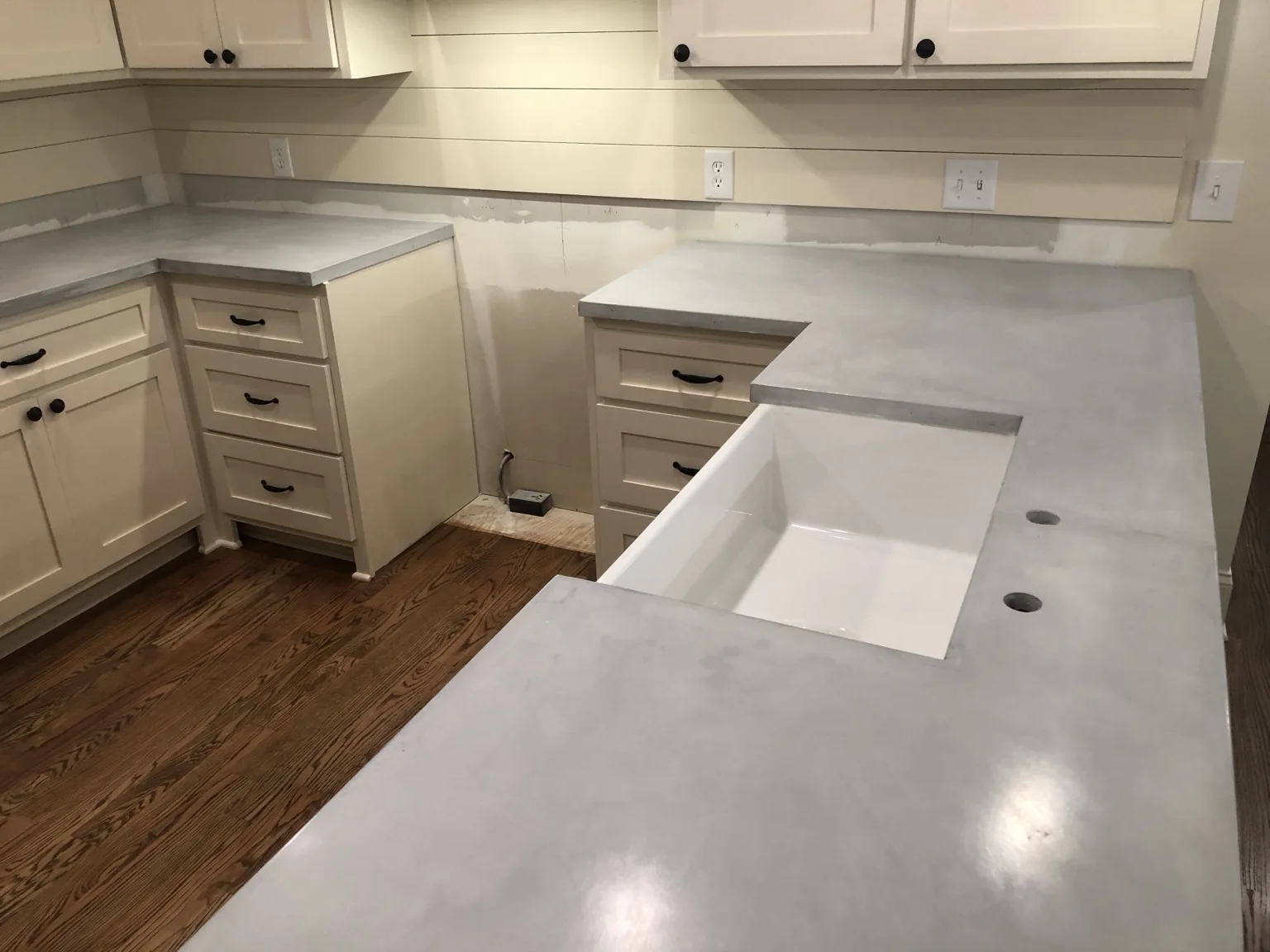 Custom concrete kitchen countertop with integrated sink opening