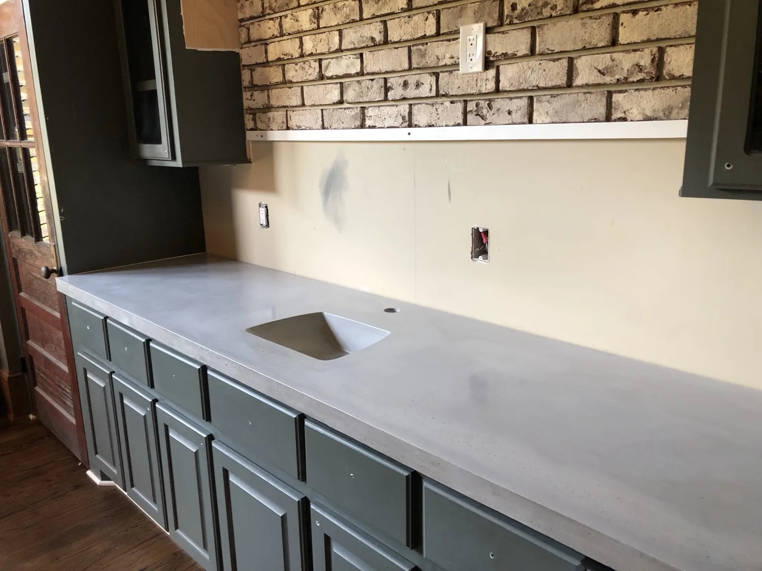 Long custom concrete kitchen countertop